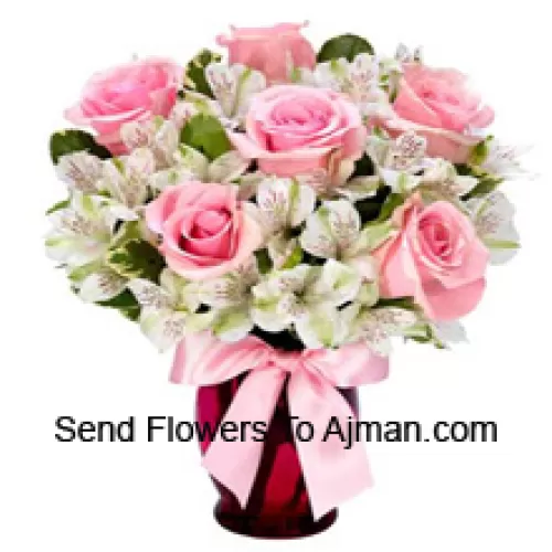 Pink Roses And White Alstroemeria Arrannged Beautifully In A Glass Vase