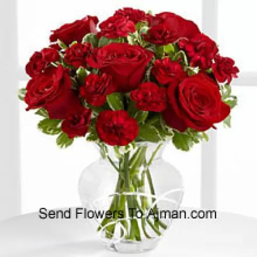 9 Red Roses And 9 Red Carnations In A Glass Vase