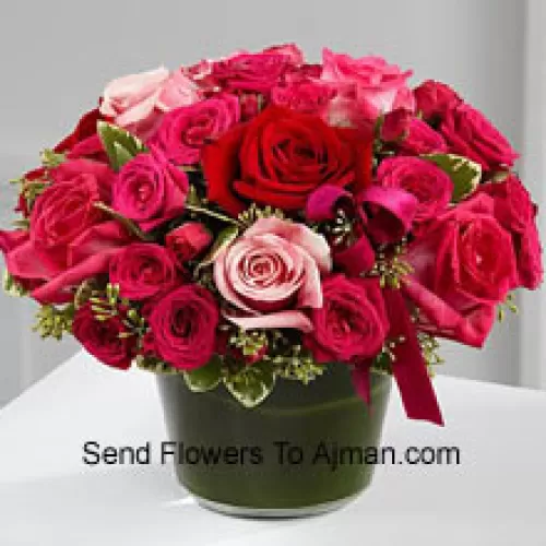 A Beautiful Basket Of Red, Dark Pink And Light Pink Roses. This Basket Has In Total 24 Roses.